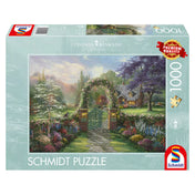 Schmidt Puzzle Thomas Kinkade Hummingbird Cottage dobozkép, 1000 darabos prémium puzzle, virágos kerttel, boltíves kapuval és meghitt vidéki házzal, Thomas Kinkade Studios illusztrációval.