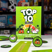 Top 10 Kalandok magyar nyelvű társasjáték doboza, számozott kártyái és karakterzsetonjai.