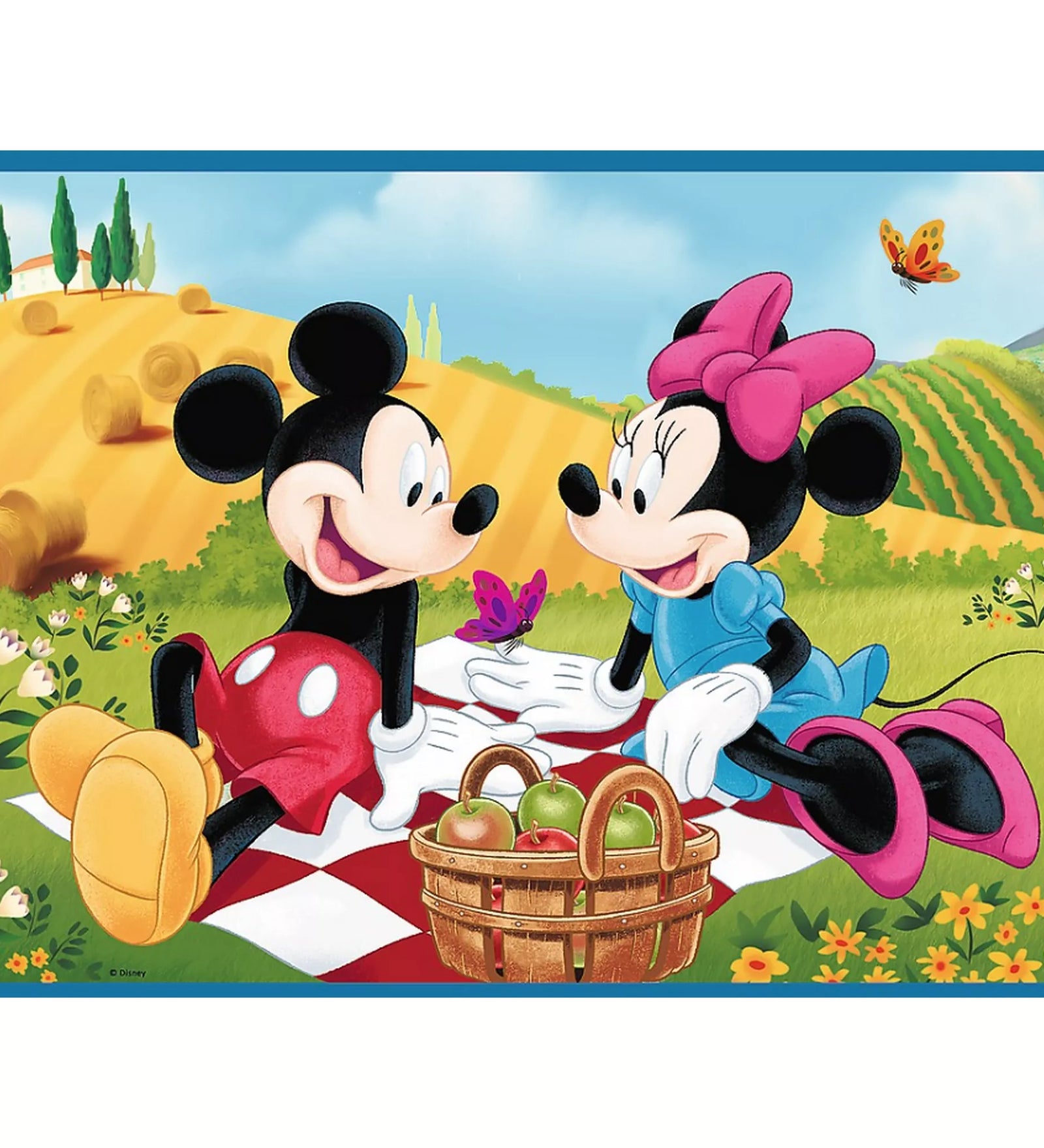 Mickey egér és Minnie egér puzzle kész kép, piknikezős jelenettel, gyümölcsös kosárral, virágos réten, vidám, színes illusztrációval, klasszikus Disney stílusban.