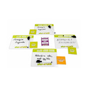 A Zöld a nyerő! társasjátékban használt táblák, kártyák és filctollak, amelyeken a játékosok válaszokat írnak. A képen láthatóak a „Zöld csapat” és „Narancs csapat” jelzései, valamint a vicces kérdéskártyák.